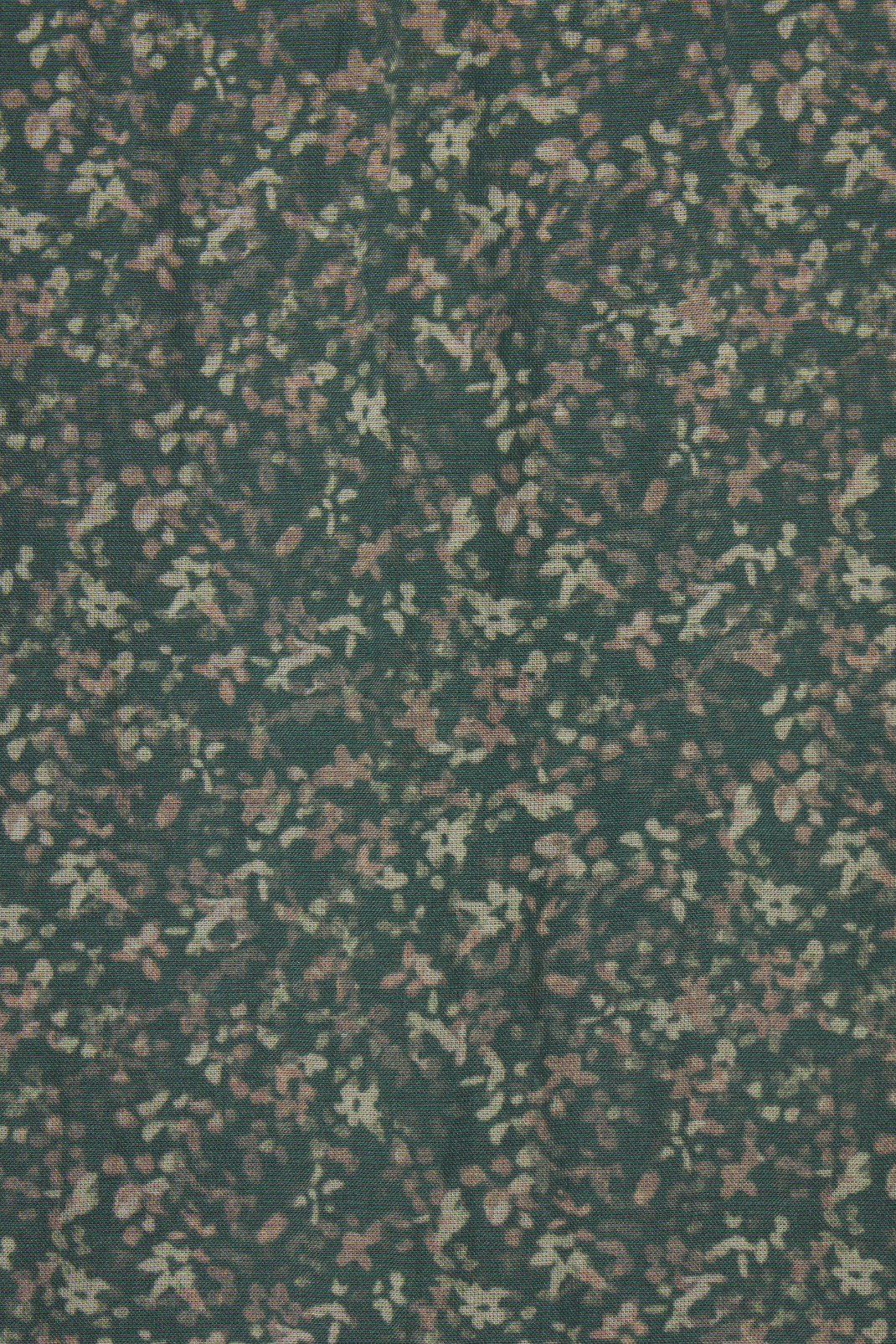 Textured fabric pattern with green and brown tones