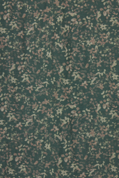 Textured fabric pattern with green and brown tones