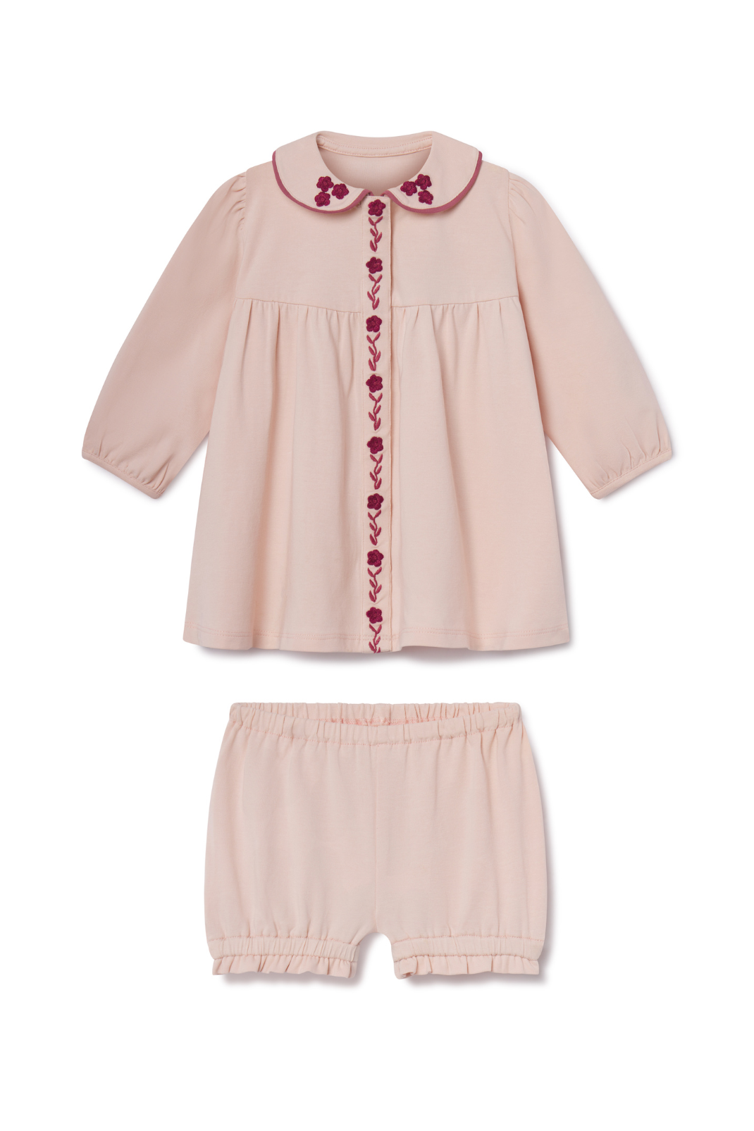 Pink baby dress with floral embroidery and matching bloomers on a white background