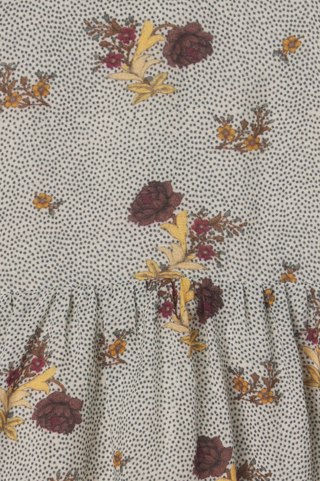 Floral patterned fabric with a subtle dot background