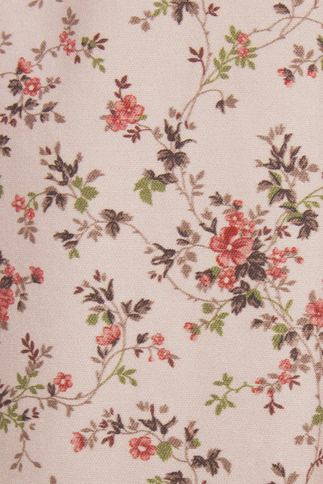 Floral pattern with red flowers and green leaves on a beige background