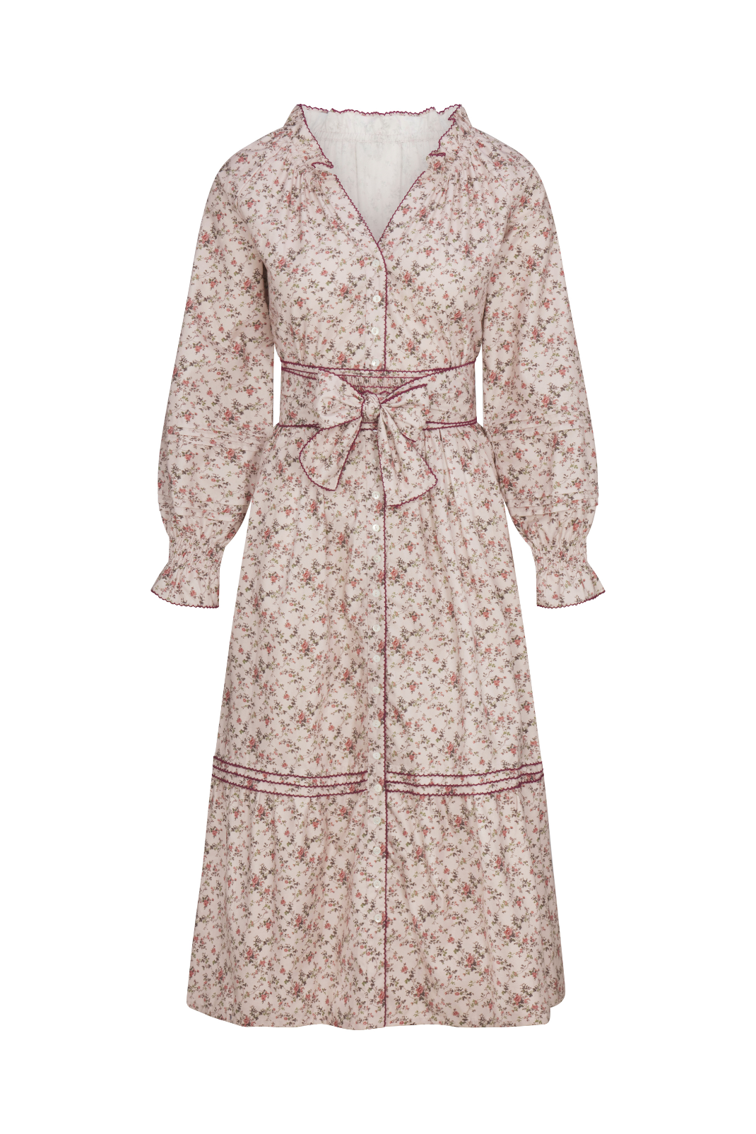 Floral patterned dress with a belt on a white background