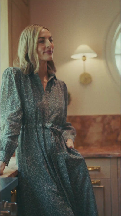 women in green floral dress