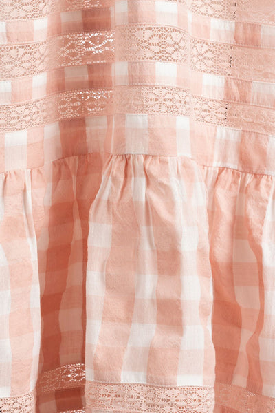 Close up of the pink gingham print