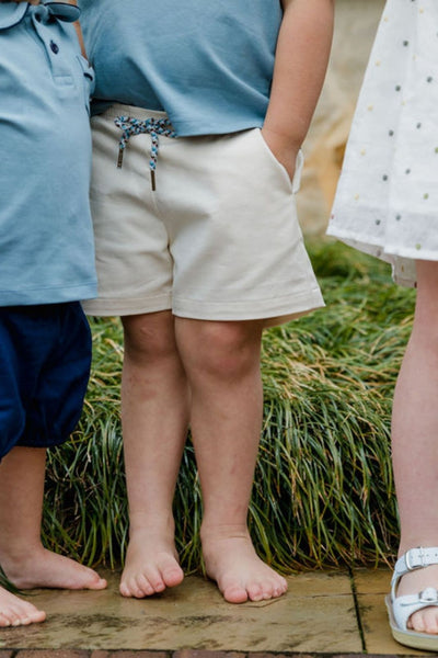 Close up lifestyle image of the jimmy short in salt